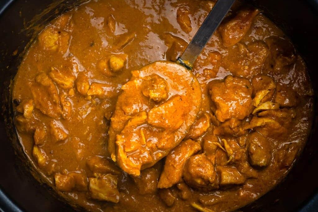 Rich curry with tender chicken chunks in a thick sauce.